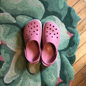 Pink platform crocs